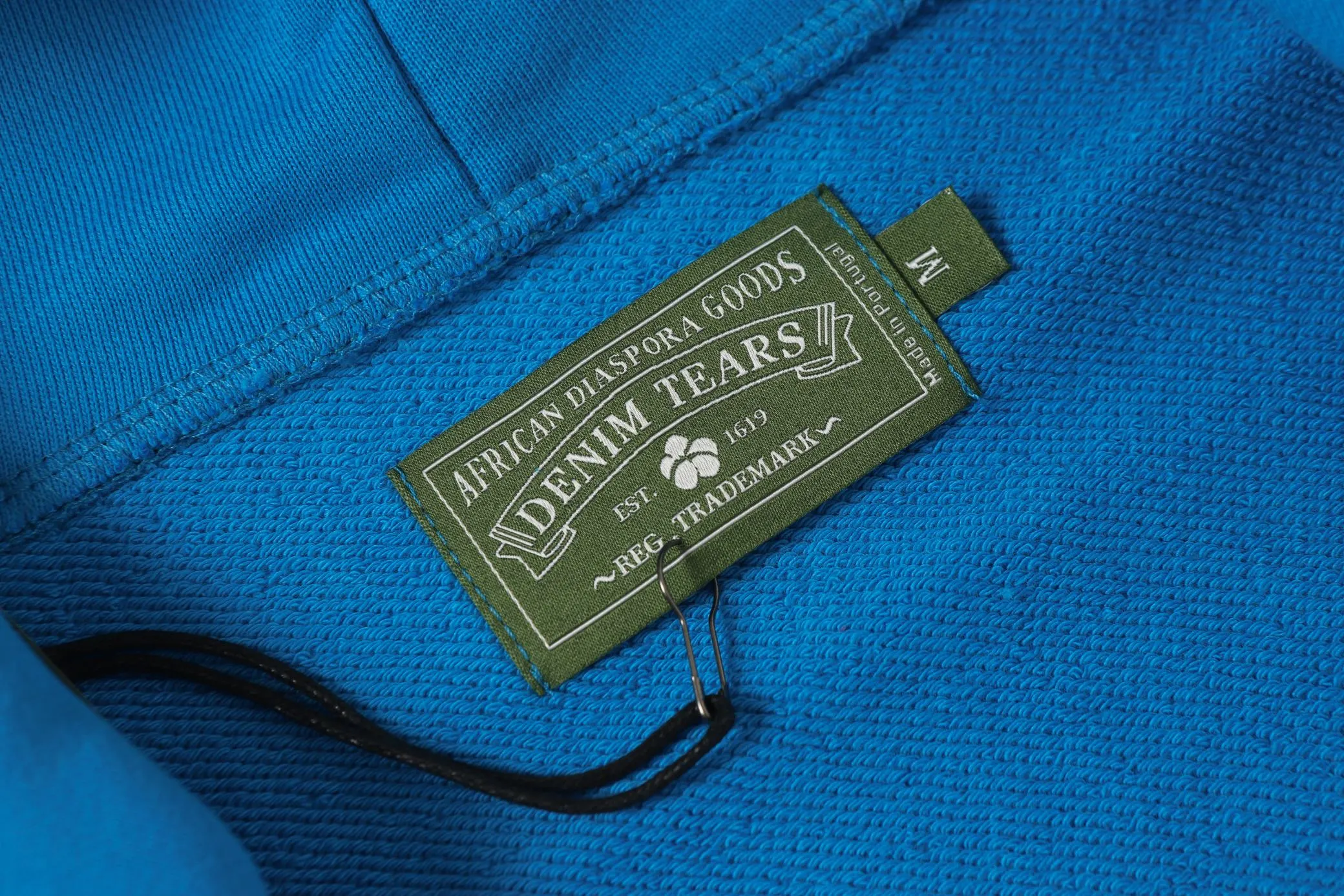 16 colors DENIM TEARS Kapok European and American trendy brand high-quality foam printed hooded sweatshirt jacket. Terry fabric weighs 380 grams. Threads are customized and dyed in the same color. Color Black Gray Blue Green Royal Blue Purple Red Orange Colorful Blue Pink White Sky Blue Brown Carbon Gray Black Gray White White Size S-XL